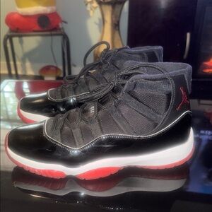 Air Jordan 11 Retro Black and Red Sneakers ‘No Box’